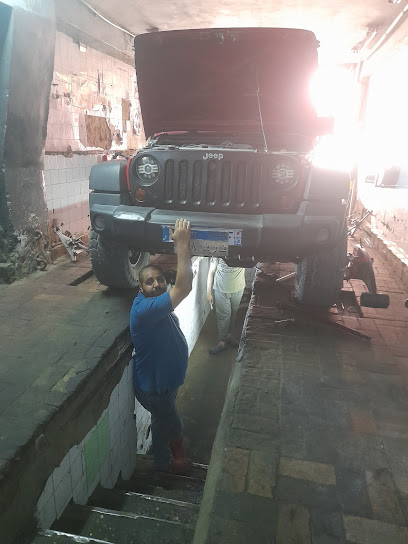 مركز هادي وبس لضبظ زوايا عجل واتزان بالكمبيوتر